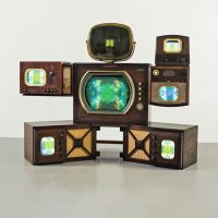 Curated by T.O.P  Paik Nam June 1932-2006 FAT BOY signed in English and dated 97 single-channel video、seven monitors、vintage TV case and six vintage TV cabinets 173(H)by 218 by 92 cm;68⅛(H)by 85⅞by 36¼in. #TTTOP Sothebys #NamjunePaik